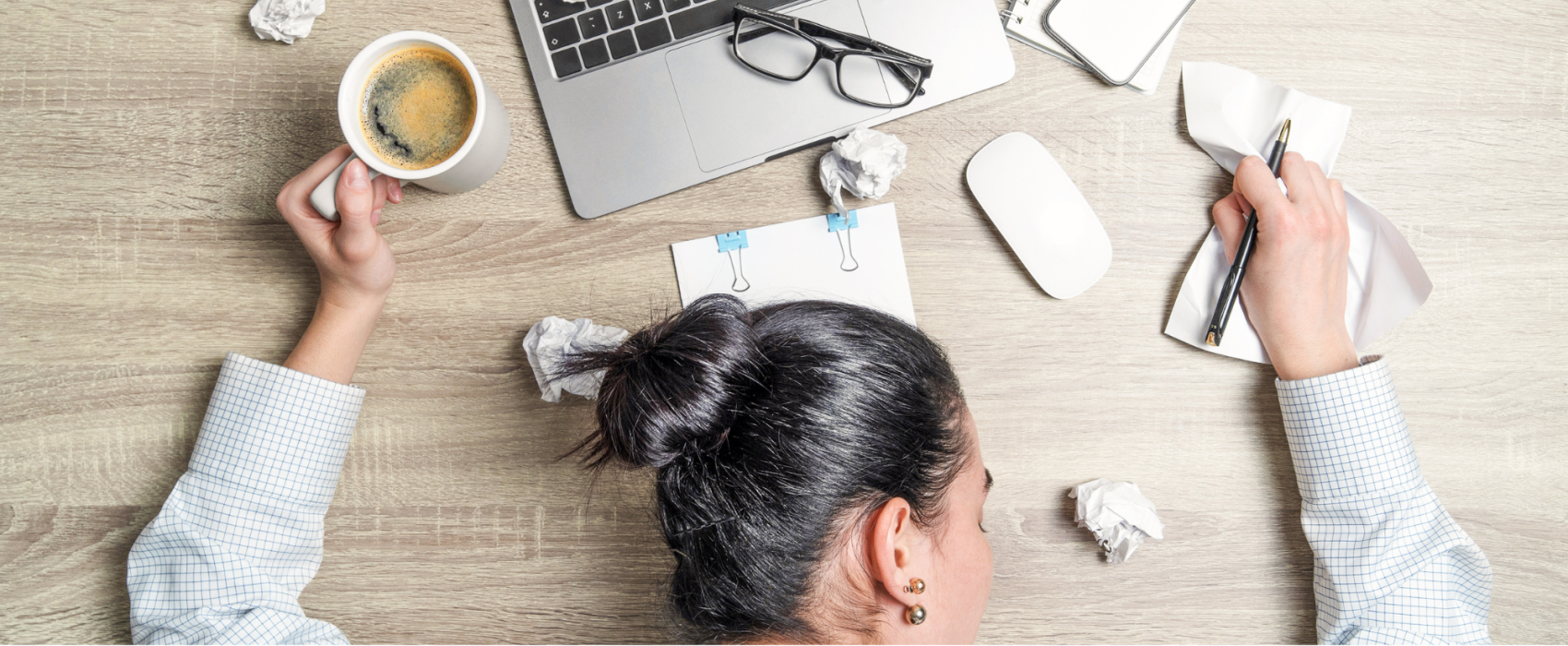 Woman stressed at a desk